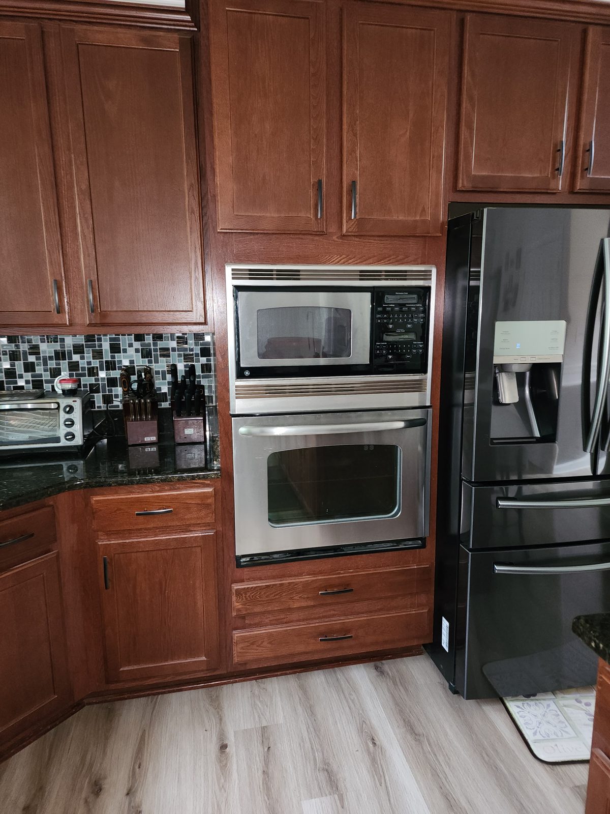 Dual microwave and oven combination unit, second view