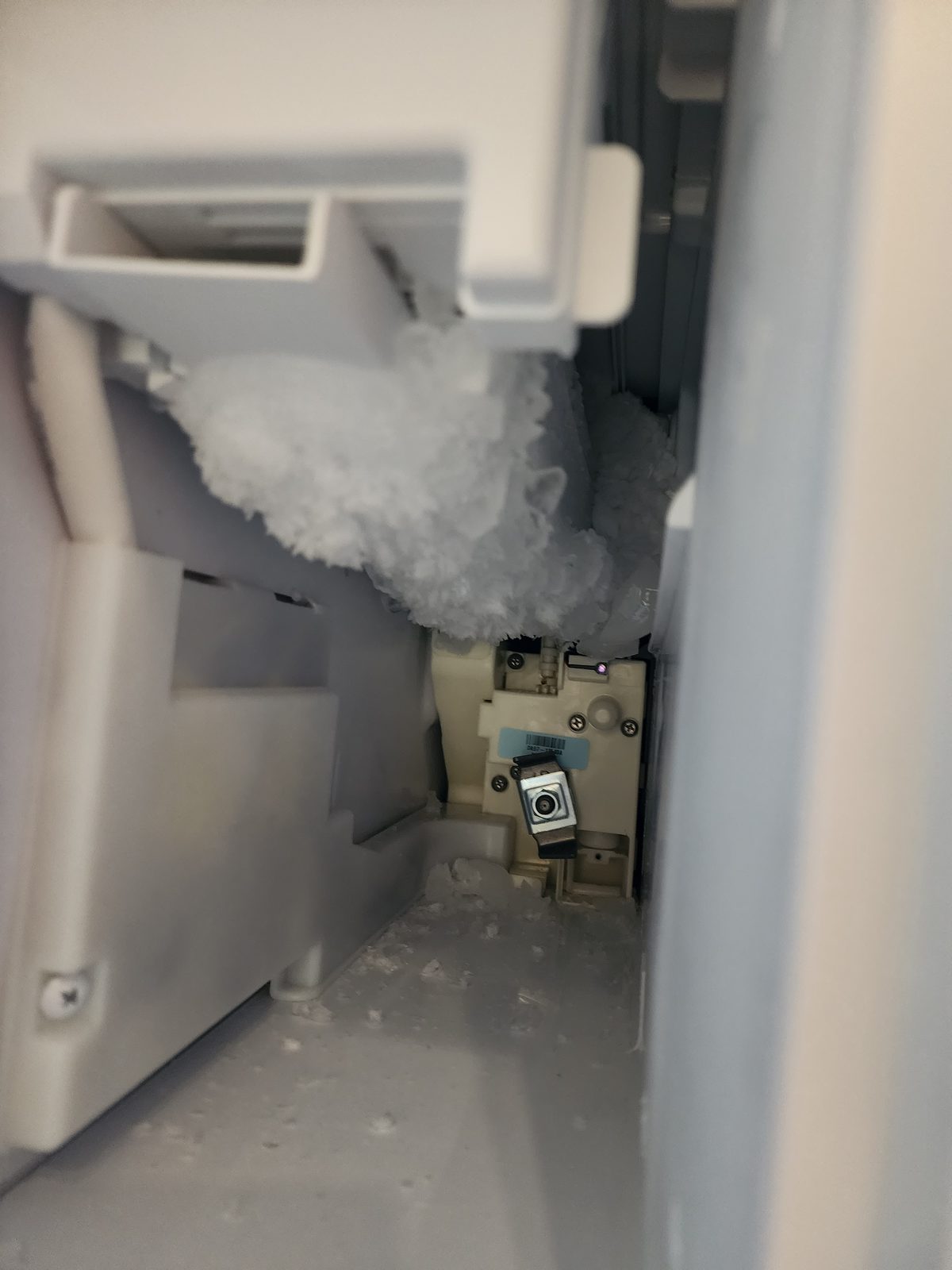 Ice maker with ice buildup