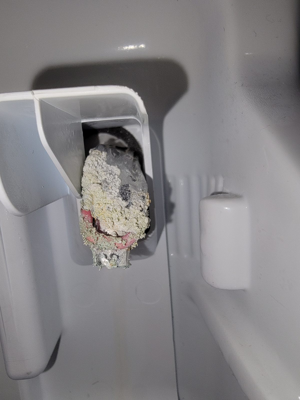 Water inlet for an ice maker with mineral buildup